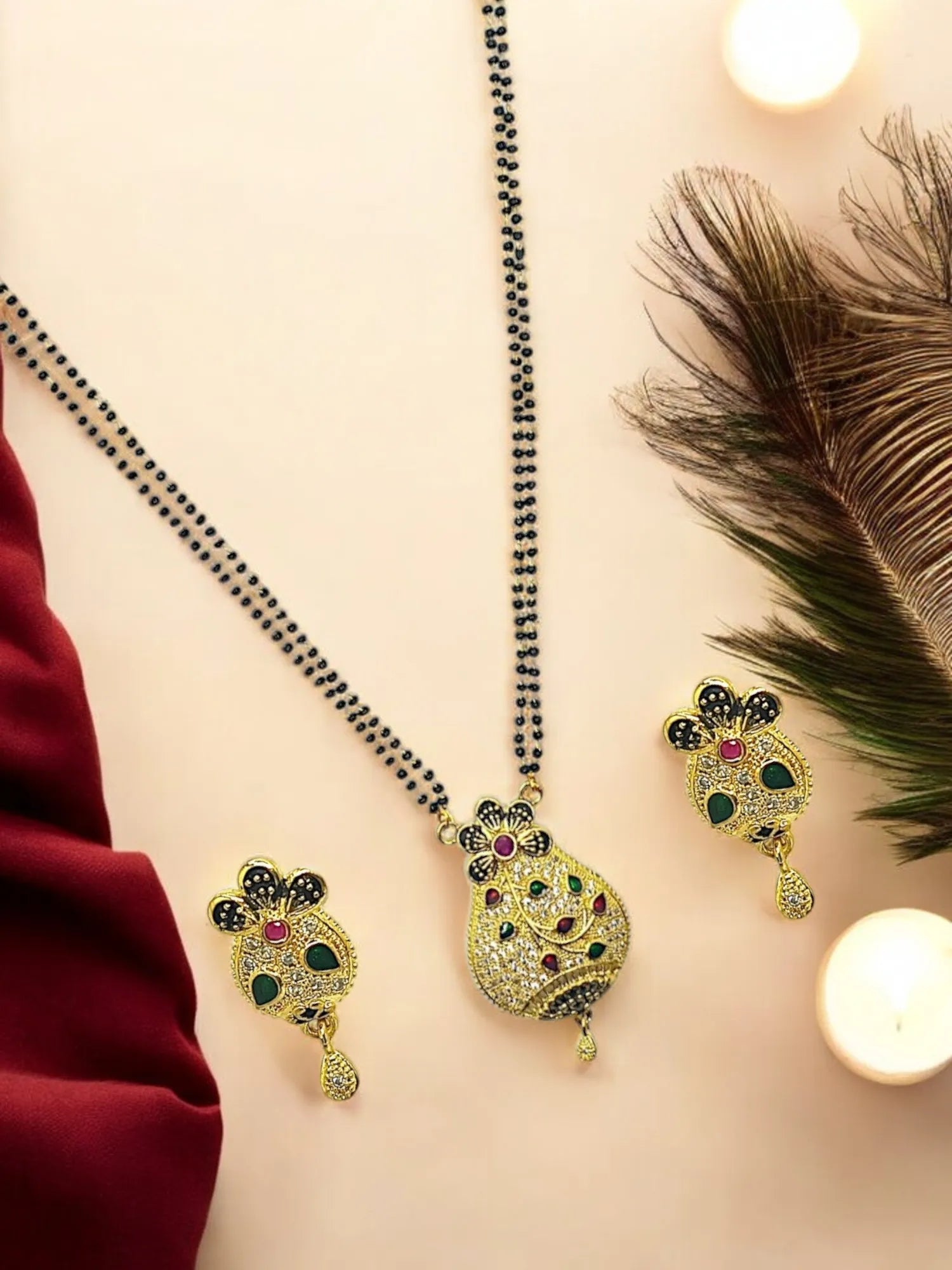 Gold-toned Pendant Stone-Studded Floral Motifs