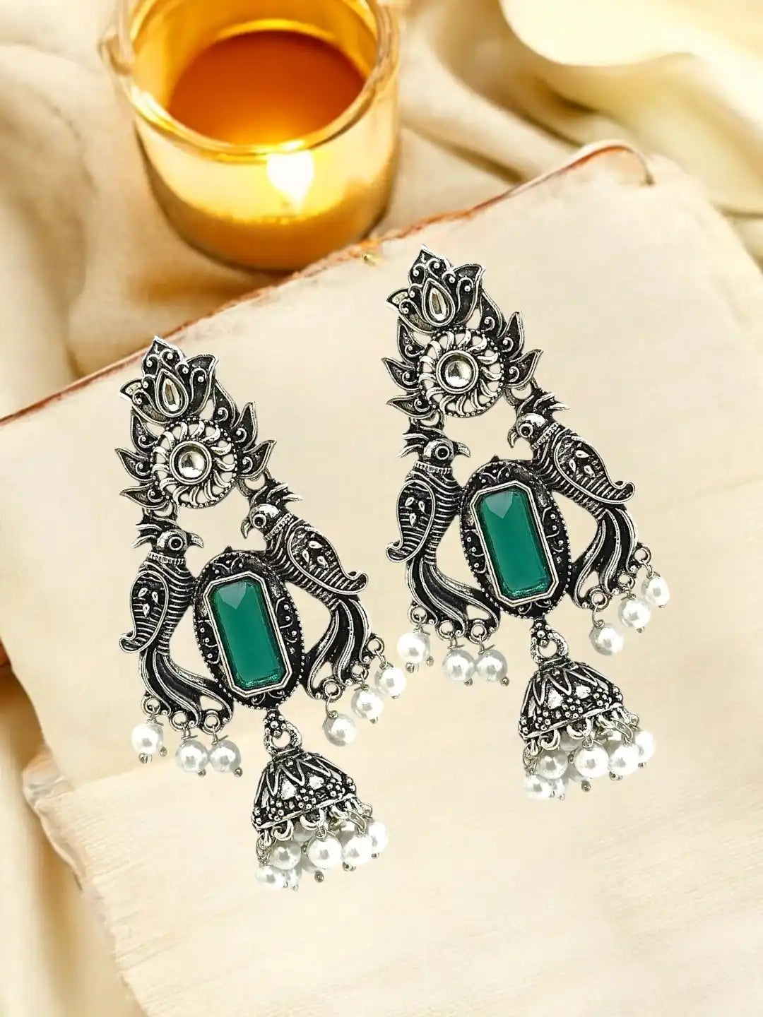 Silver Oxidised Peacock Motif Green Jhumka Earrings