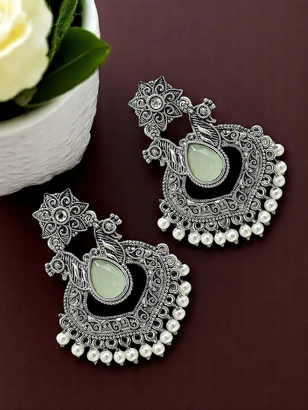 Silver Plated Jhumka with Mint Green stone Studded