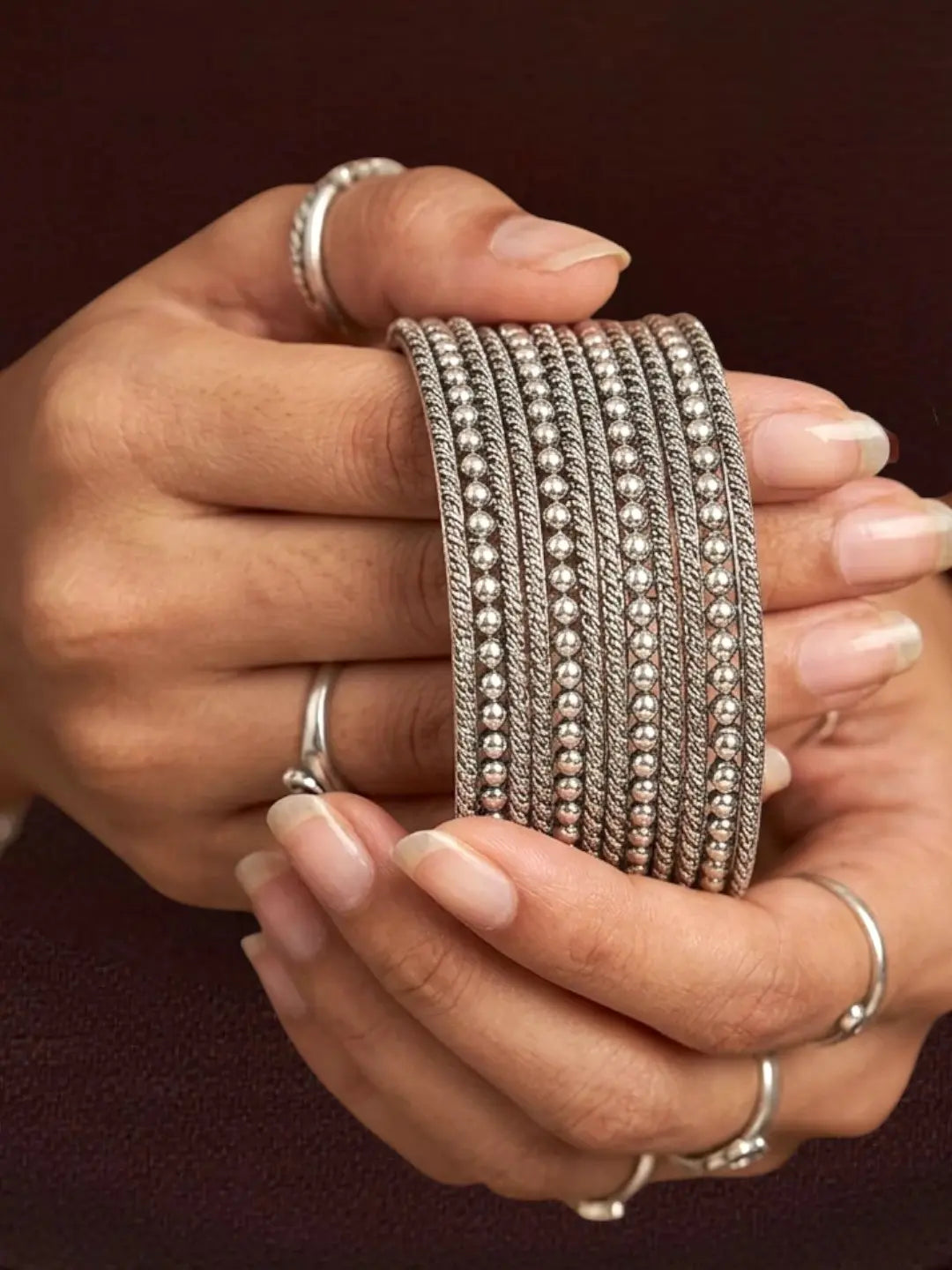 Silver Oxidised Set Of 12 Beaded Textured Bangles