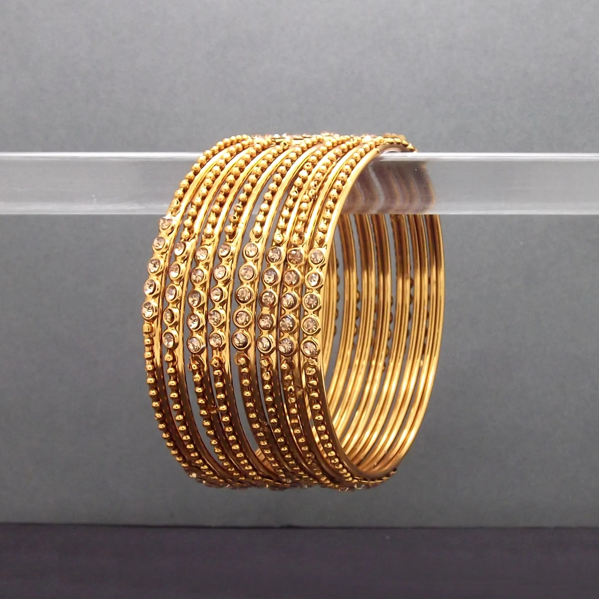 Artisan's Delight: Handcrafted 8-Piece Artificial Stone Bangle Set