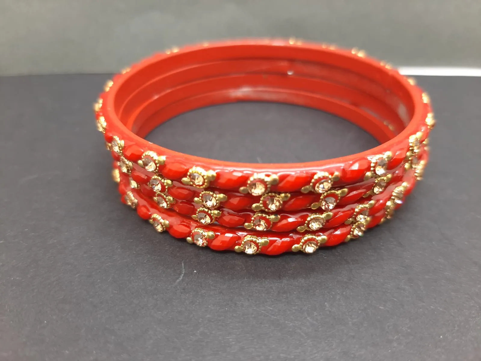 Set Of 4 Red Stone Studded Glass Bangles Set