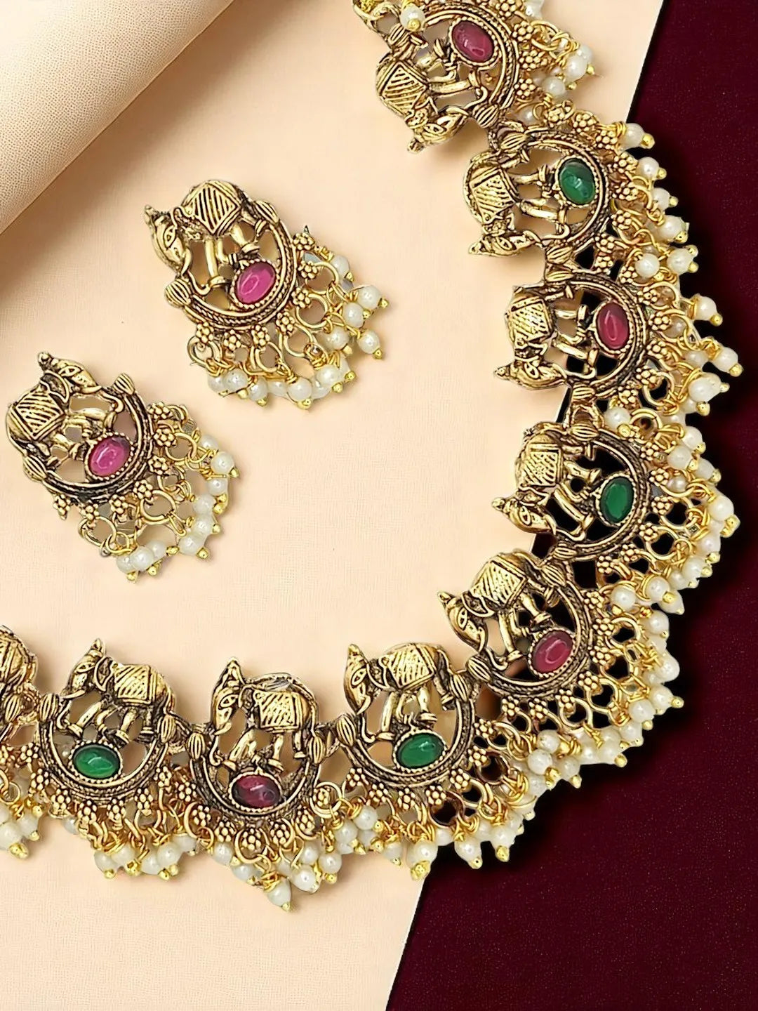 Gold-Plated Elephant Motifs Stone Studded Jewellery Set