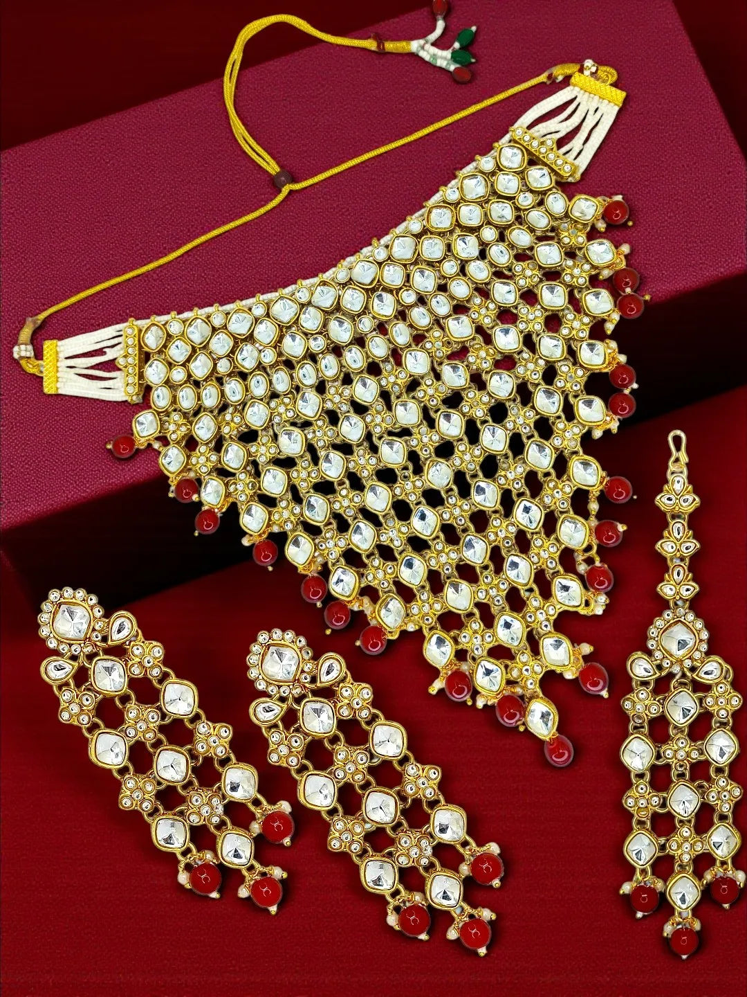 Women Gold-Plated V-Shaped Stone-Studded Jewellery Set