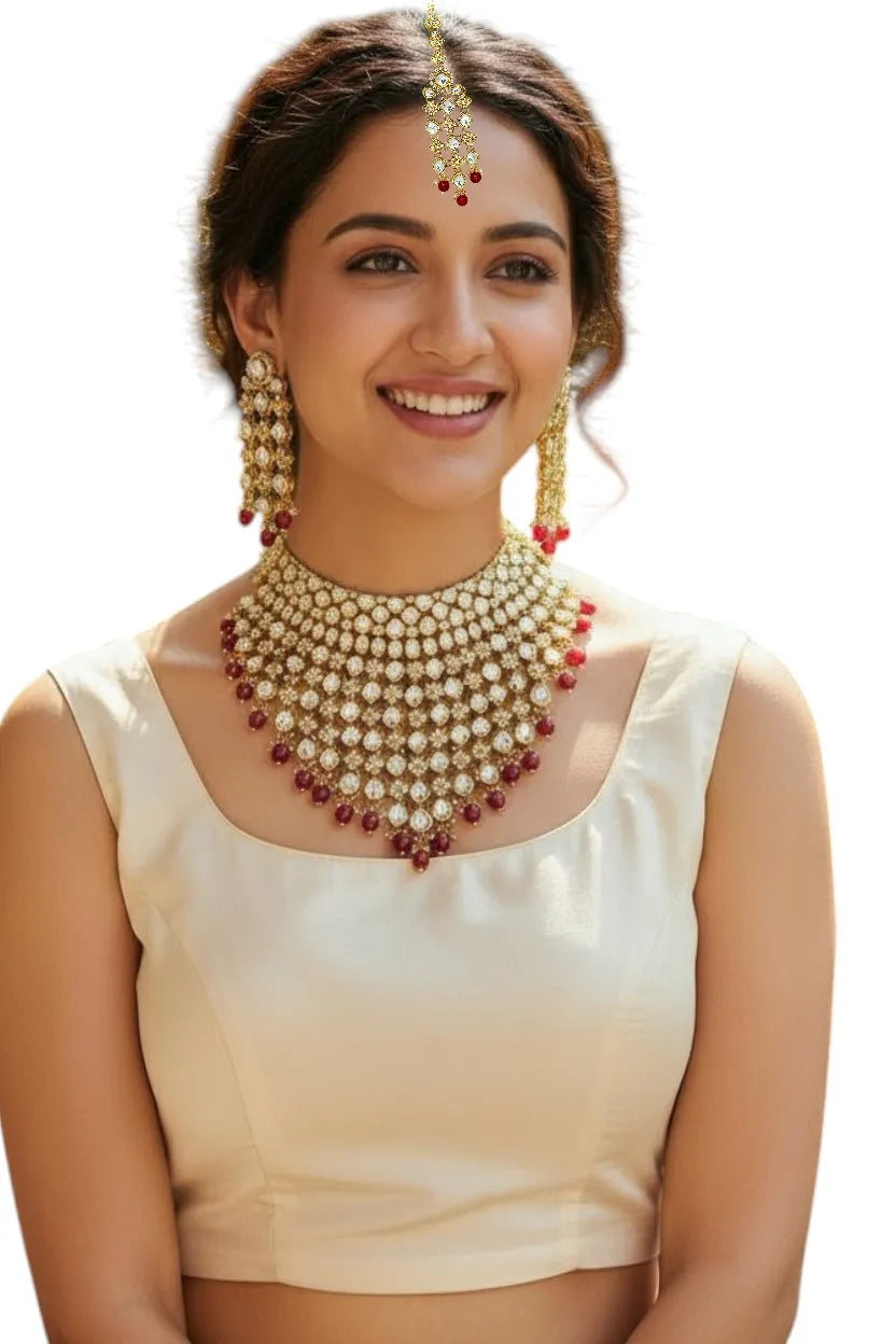 Women Gold-Plated V-Shaped Stone-Studded Jewellery Set