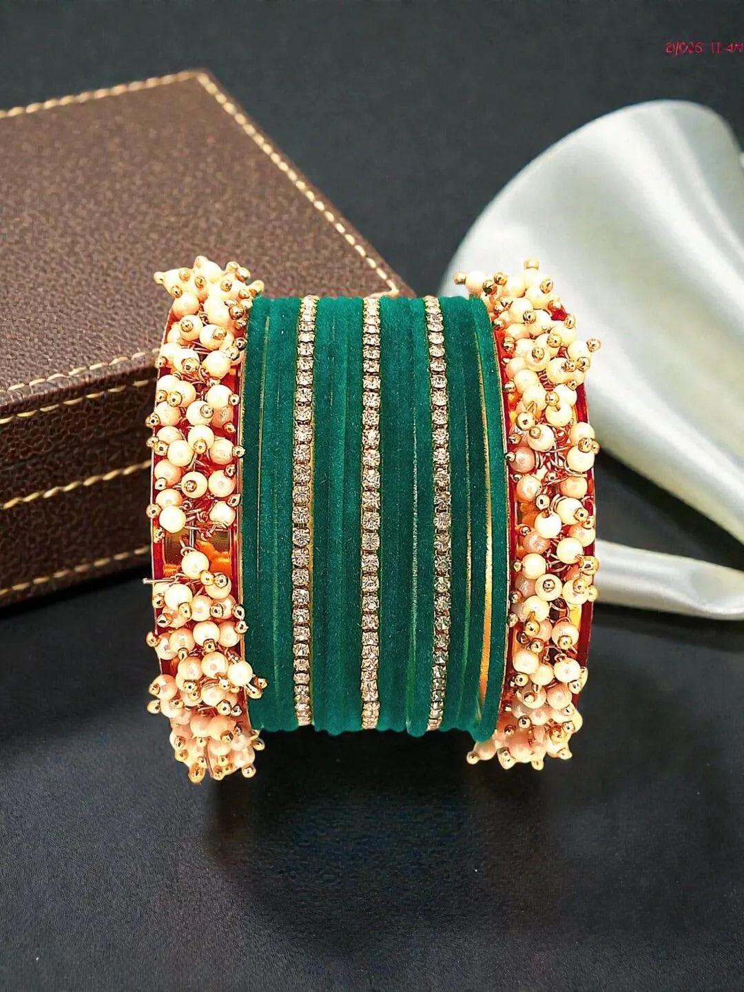 Set Of 17 Gold Plated CZ Green Velvet Bangle Set