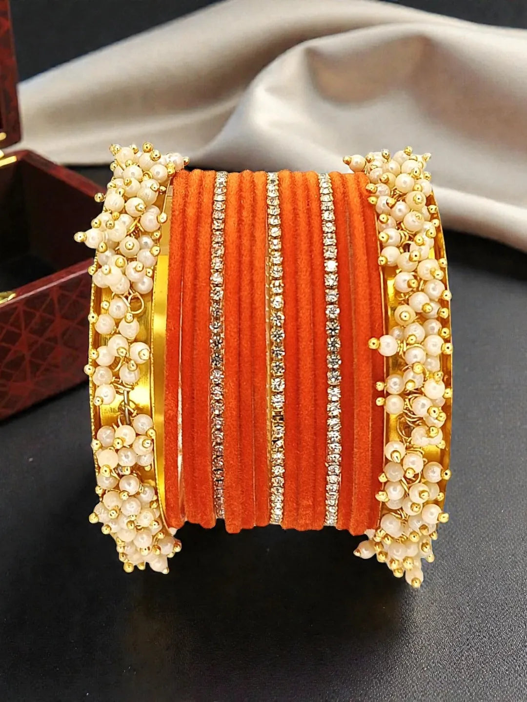 Set Of 17 Gold Plated Orange Velvet Bangle Set