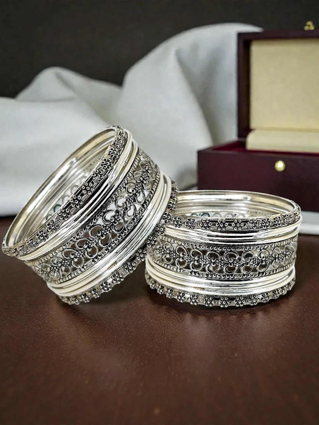 Silver Oxidised Set Of 18 Cutwork Pattern Bangle Set